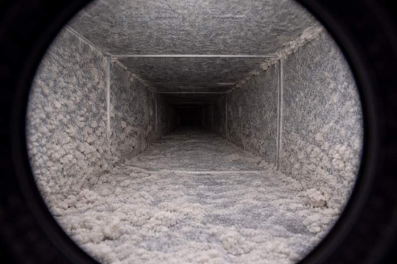Camera view showing dust buildup inside residential air duct